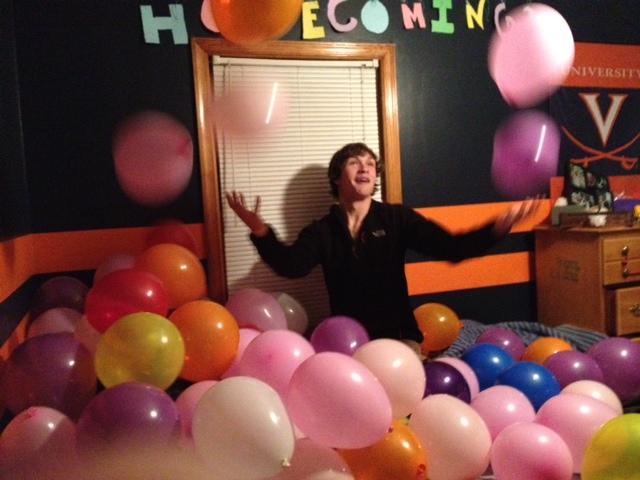 Senior Kelsey Cross asked her boyfriend Eric Bingler (AHS 12) to homecoming by filling his room with balloons. 