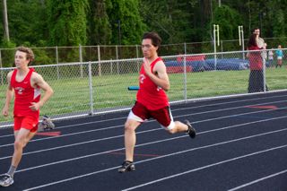 Senior captain James Oh runs during a meet against Orange on May 8, where both the girls’ and boys’ teams took first place. 