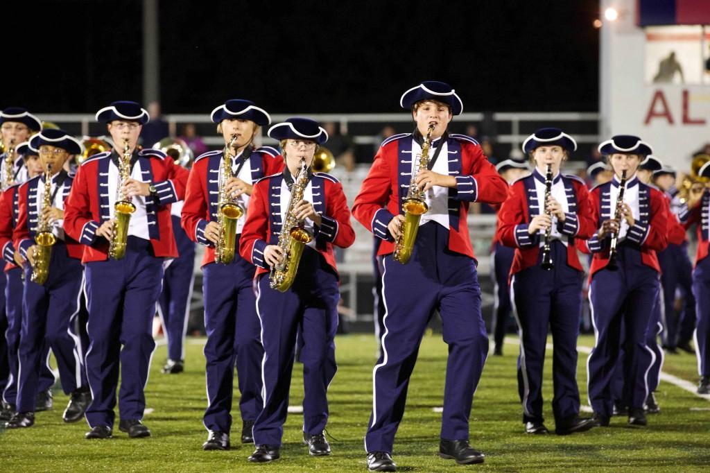 Marching Their Way to Success: Band Puts in Long Hours in Order to Party on the Other Side