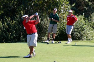 Senior Austin Yoon tees off against
William Monroe in a pre-season scrimmage match on Sept. 4.