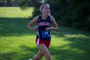 Sophomore Steph Ellena runs during the Ragged Mountain Cup at Panorama Farms on Sept. 3, where the girls' team placed second.