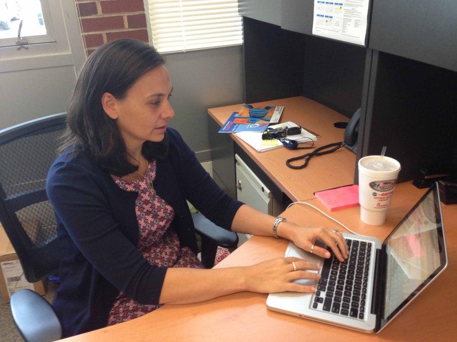 New assistant principal Megan Wood checks information on her computer. Wood is excited to join the AHS faculty, after working at Jouett and Henley as a teacher and instructional coach for the past thirteen years. 