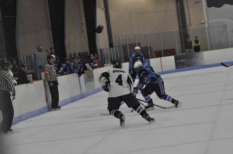 Senior Matt Huschke makes a move for the puck in a game against the Frederick Jr. Freeze. The Blue Ridge Bears compete against other hockey teams throughout Virginia and Maryland.