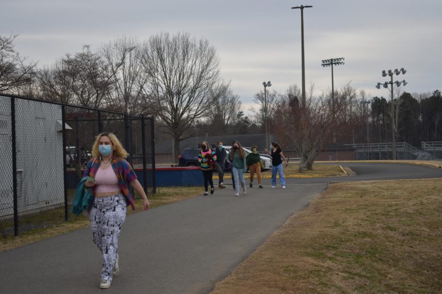 Albemarle students leave the building at 9:30 am to protest the lift of a mask mandate in schools.