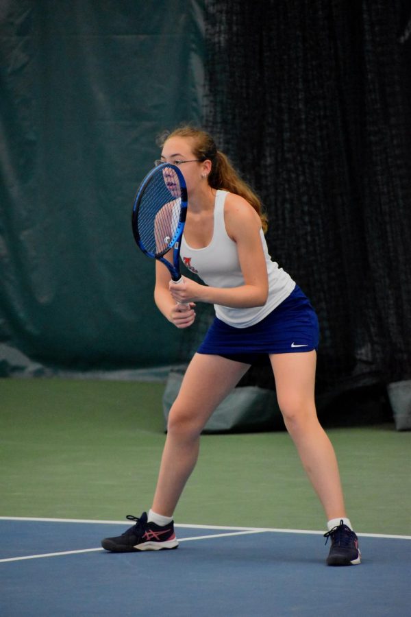 Freshman Caroline Funk adjusts her stance as her third seed opponent prepares to serve.