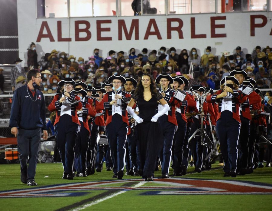 Bruno leads the Marching Patriots out onto the field at the beginning of a half-time performance. She was drum major for the past two years. 