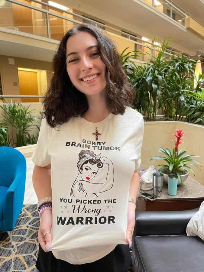 Ginny shows her strength , wearing a sorry brain tumor you picked the wrong warrior t-shirt.