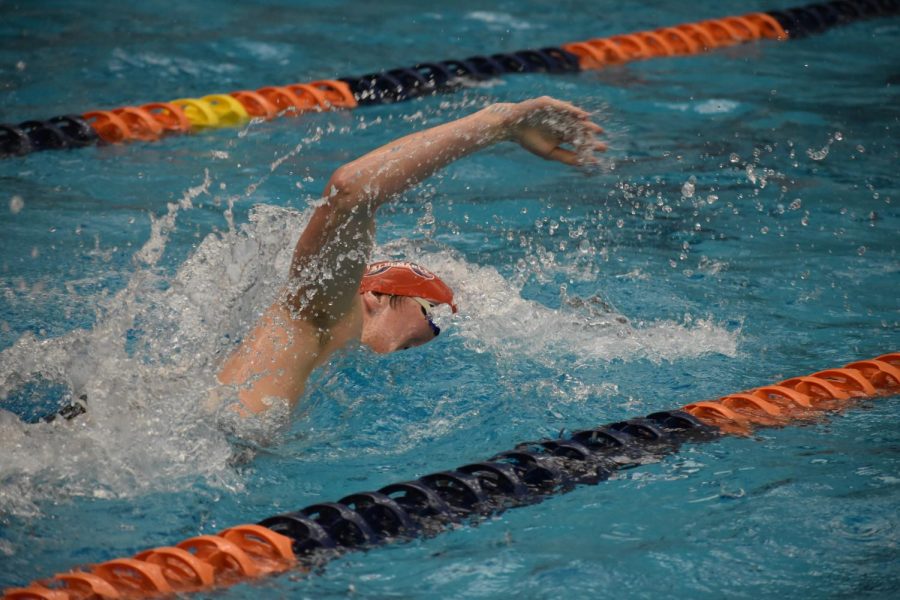 9th grader Chase Eaton propels himself through the water during the boys 100 freestyle at the Jan. 10 Ben Hair Meet. He placed third in his heat.