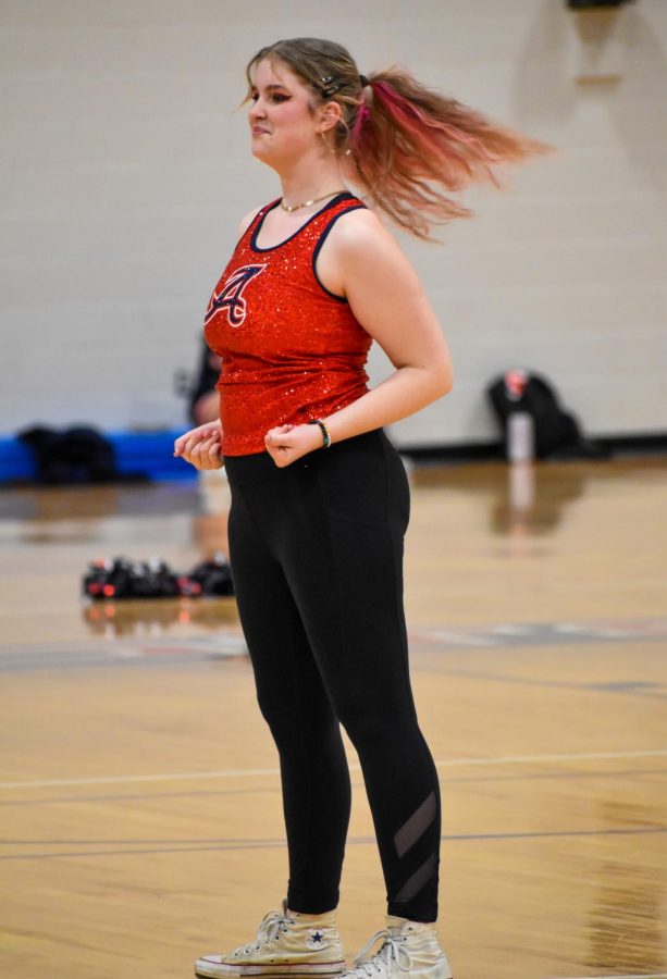Dance Team captain senior Gracie Bitrick performs Maneater by Nelly Furtado for the half-time show.