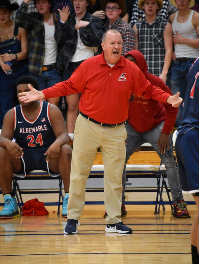AHS Head Coach Greg Maynard throws out his arms in frustration after a referee call against Albemarle in the fourth quarter. 