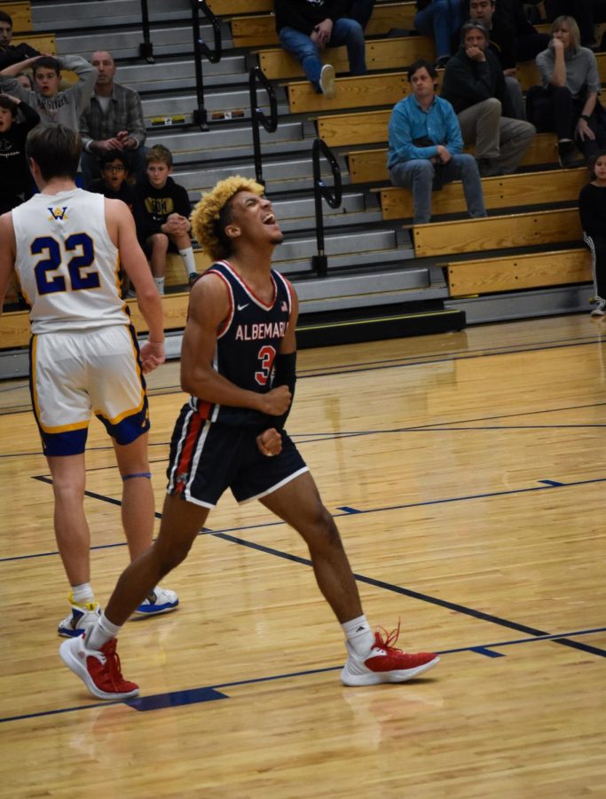 Senior Christian Humes gets excited after AHS receives a free throw attempt in the third quarter of the game. 