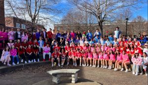 All V-Day groups together for a picture in the breezeway before a long day of dancing and serenading the school. 