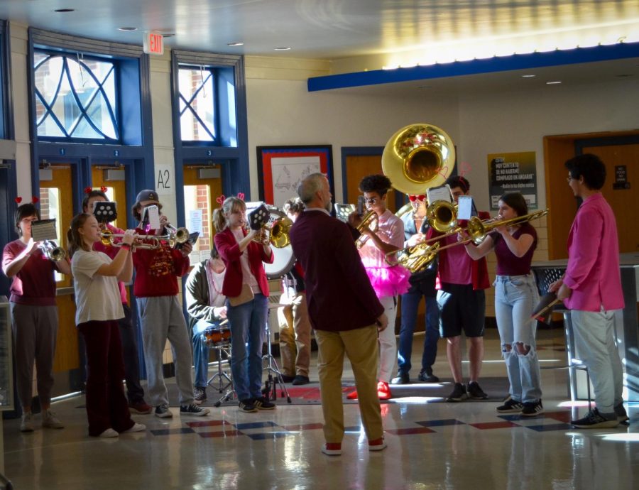 Brass Choir performs for Principal Bonham in the lobby.