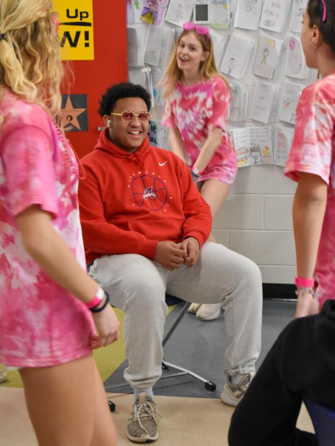 9th grader Maxwell Keys is all smiles while receiving a dance from Cupid’s Cuties. 