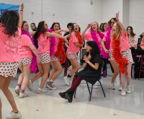 Senior Brisa Caballero-Chigo smiles with glee as Ur Dream Gurlz members surround her while chanting Its Mr. Steal your girl from the song Bottoms Up by Trey Songz and Nicki Minaj. 