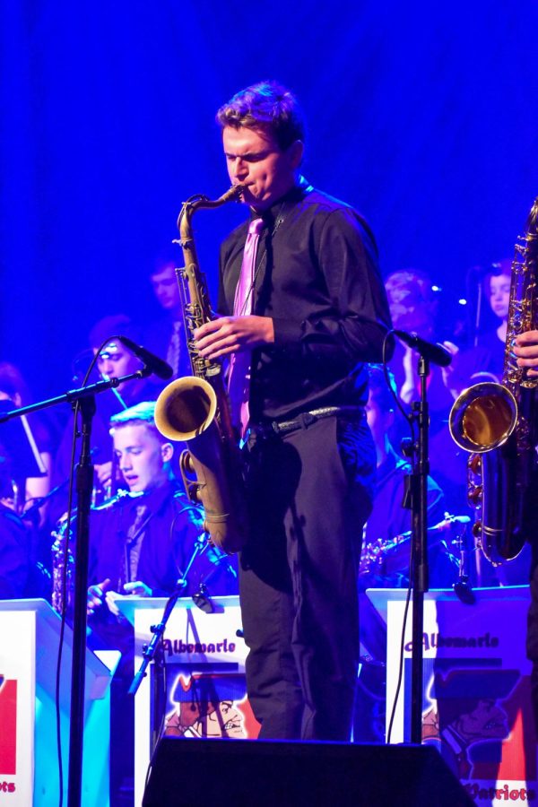 Senior Graham DeVito plays saxophone during Espoo You by Jeff Coffin.