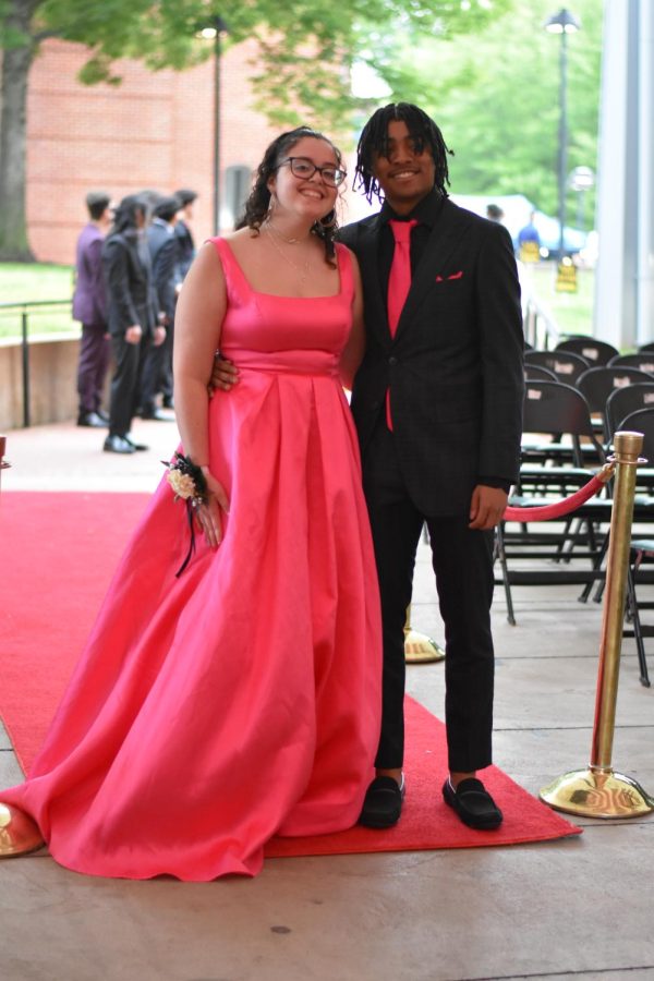 Senior Aria Deane goes for a matching pink look with date junior Quintin Douglas.