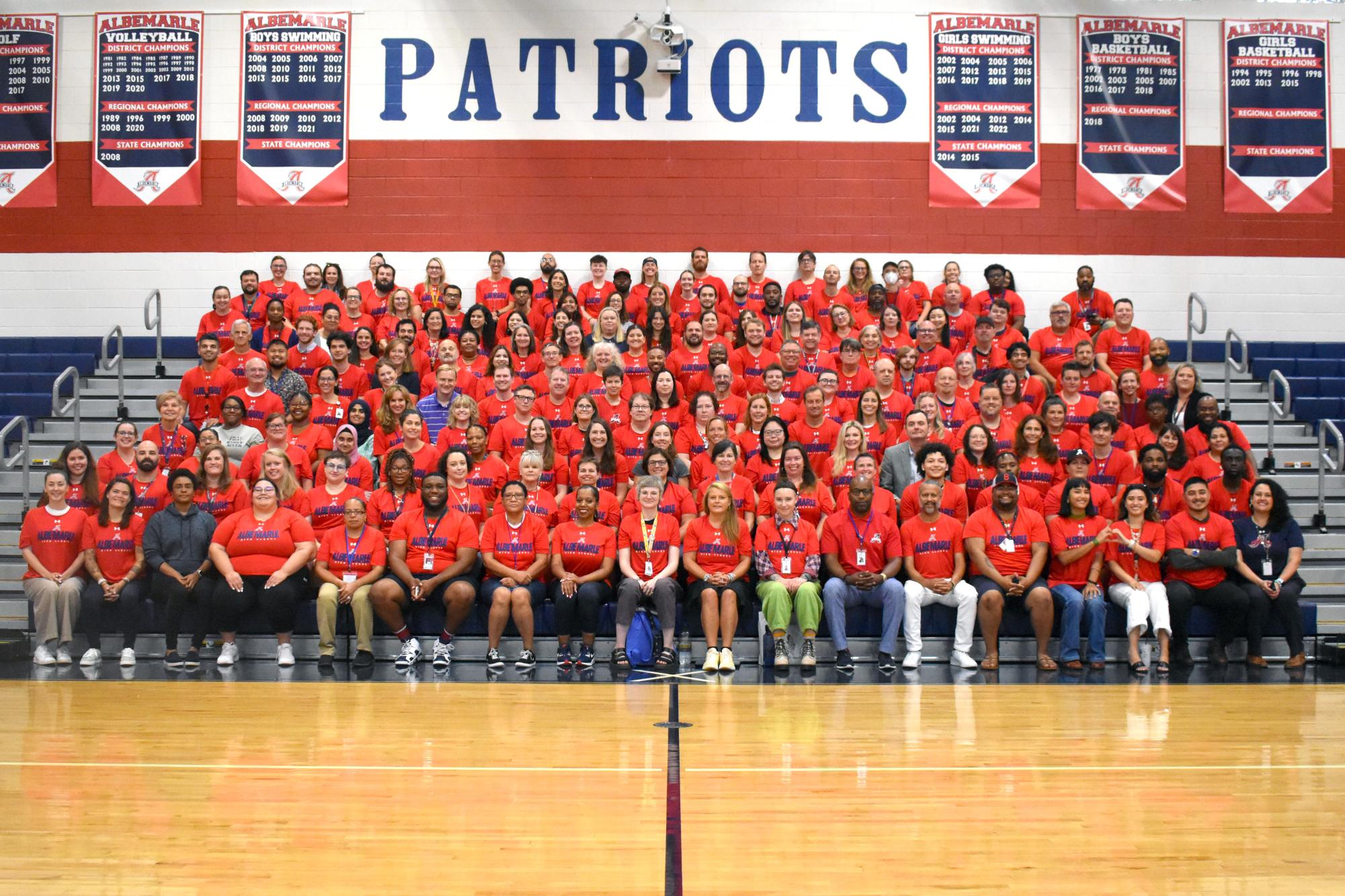 The '24-'25 AHS staff poses for their annual picture in their new t-shirts. 