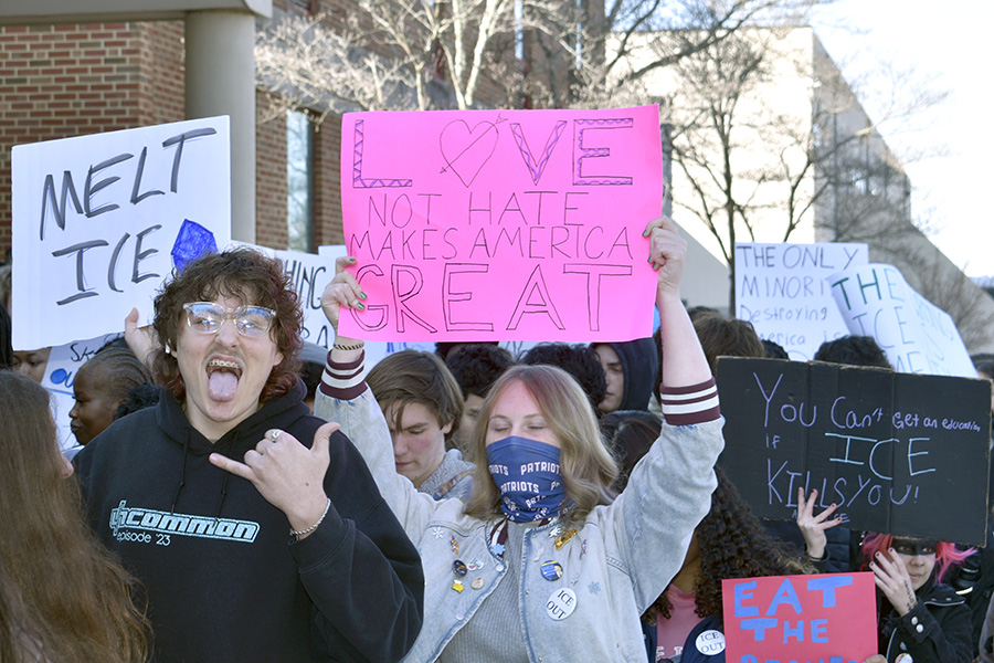 Students gather in the AHS bus lot before leaving campus.